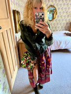 Brunsborough Frayed Edge Jacket in Forest Green worn with a printed maxi skirt