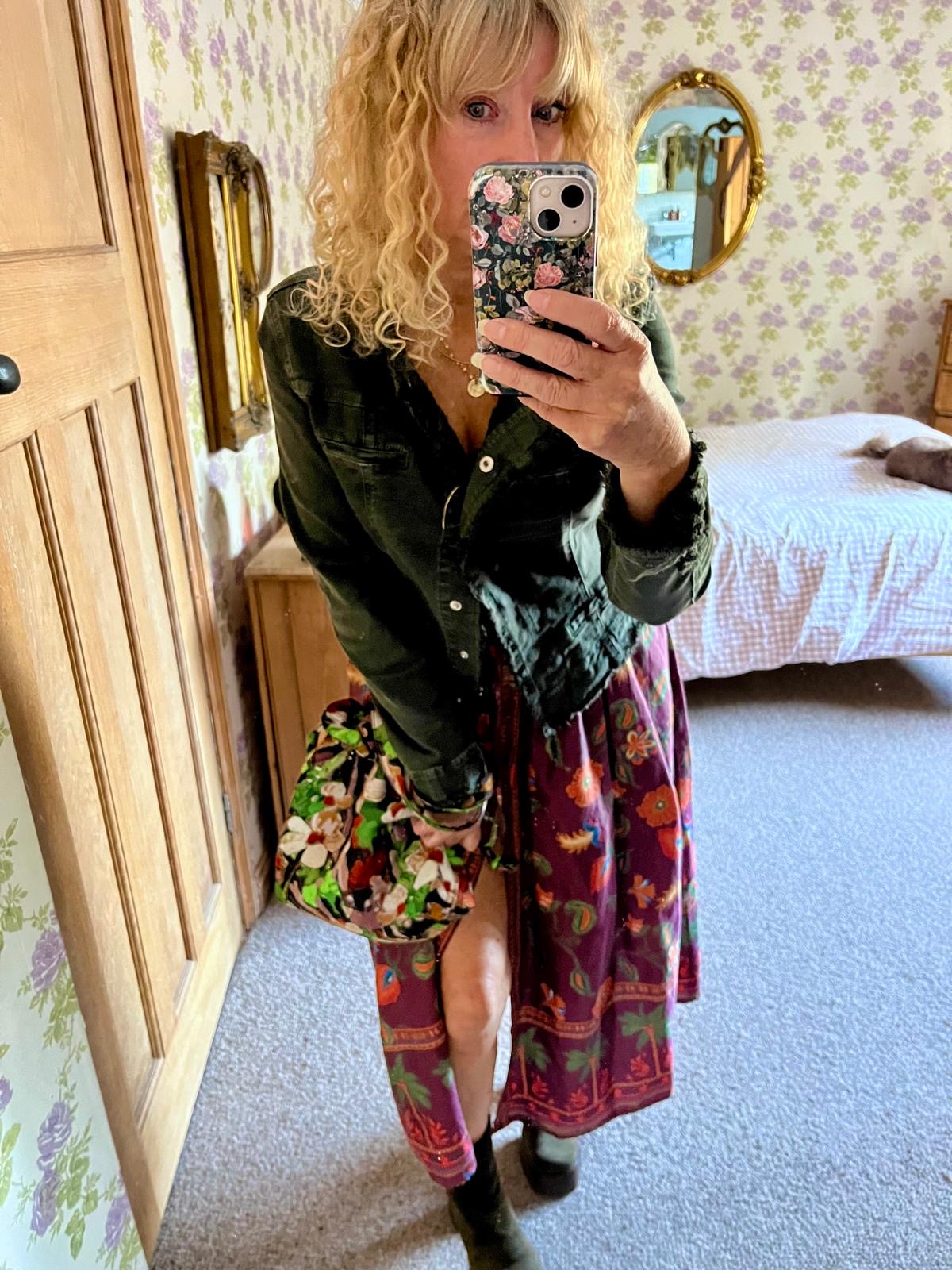 Brunsborough Frayed Edge Jacket in Forest Green worn with a printed maxi skirt