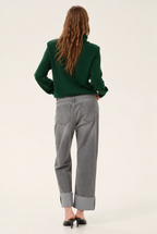 Back view of DallasMW 139 High Straight Y jeans in Light Grey Wash, showing rear pockets and wide turned-up hems.