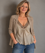 Champagne lace-trimmed camisole with a gathered V-neck, worn with a taupe blazer and blue jeans