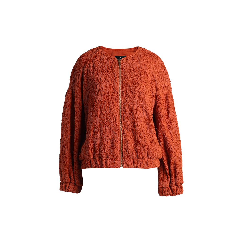 Emelia Jacket in Burnt Orange, front view showing the collarless bomber shape and elasticated hem