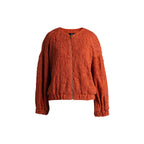 Emelia Jacket in Burnt Orange, front view showing the collarless bomber shape and elasticated hem