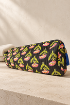 Grand Wash Bag in Black Bloom, showing the wide zip opening and blue tassel zip pull