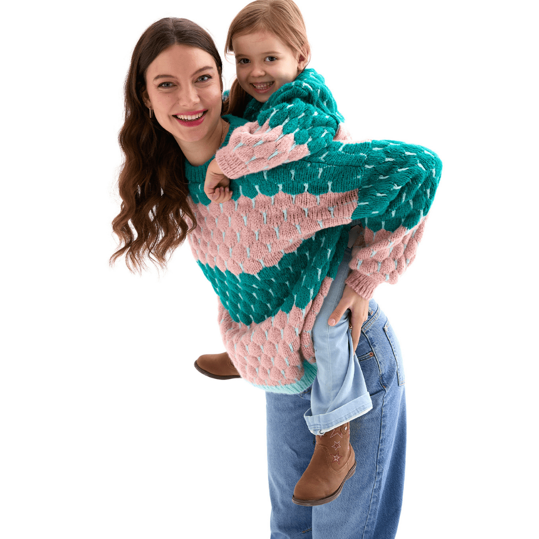 Marissa Bubble Stitch Jumper in green and pink, showing the massively oversized shape