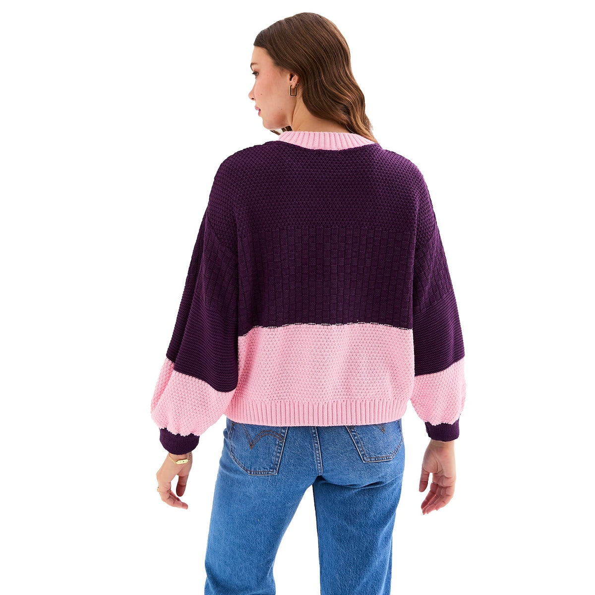 Taz Colour Block Jumper in plum and pink, styled with blue jeans