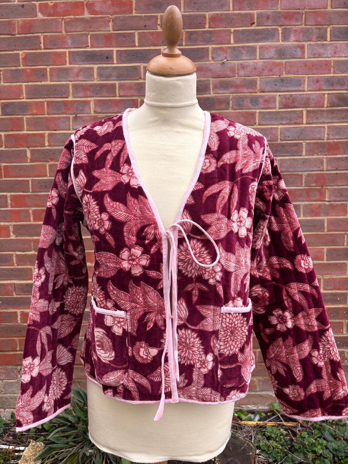 Tie Front Velvet Jacket in Burgundy, front view showing the pink floral print, silky trims and ties