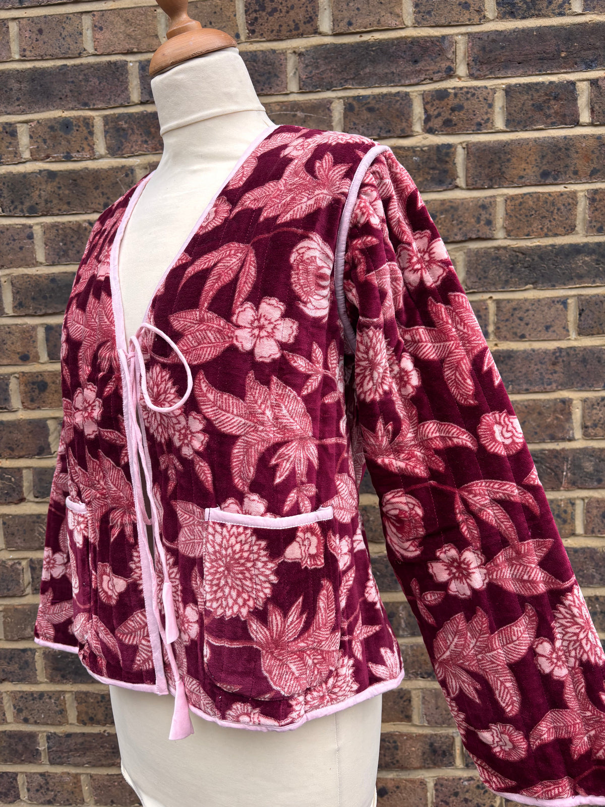 Tie Front Velvet Jacket in Burgundy, three-quarter view with pink-trimmed patch pocket